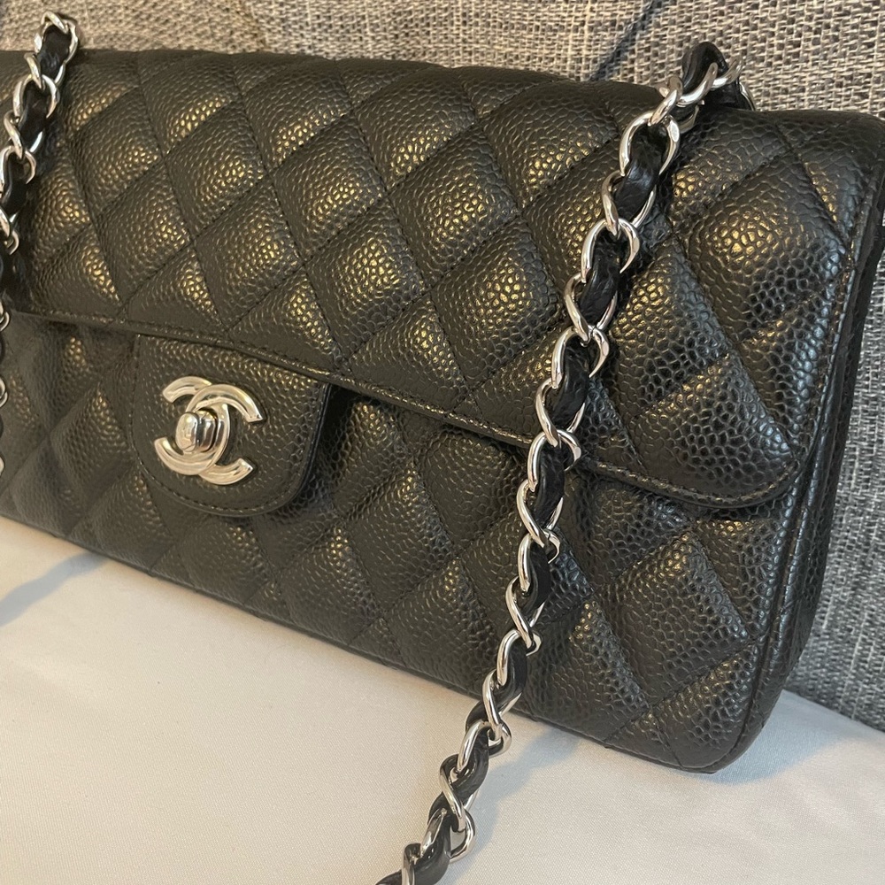 Chanel east west model black caviar single flap
